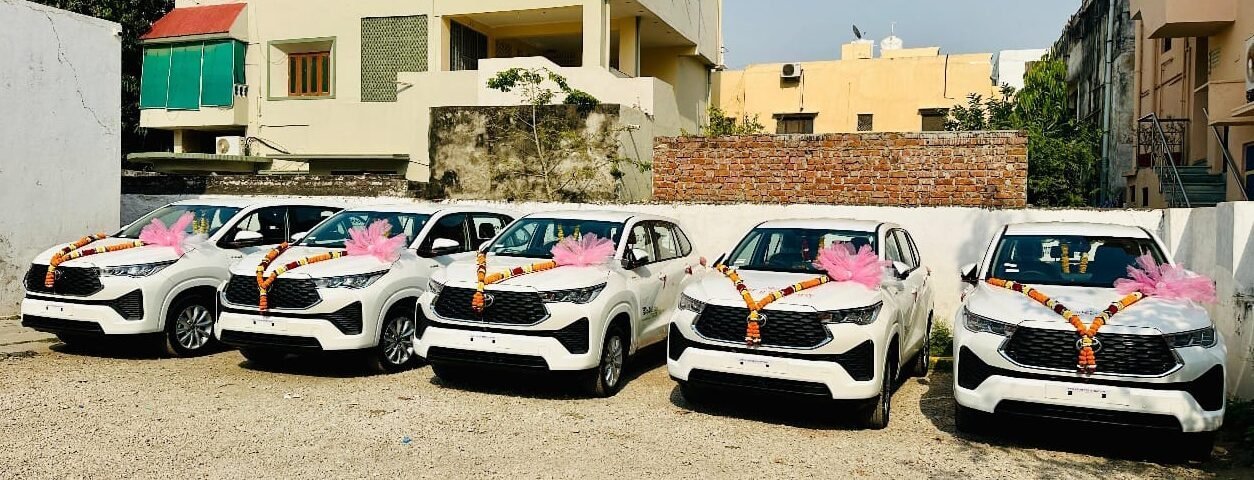Convoy of Innova Crysta taxis